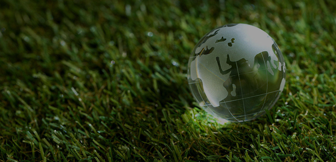 Image of a farmer shaking hands or field staff